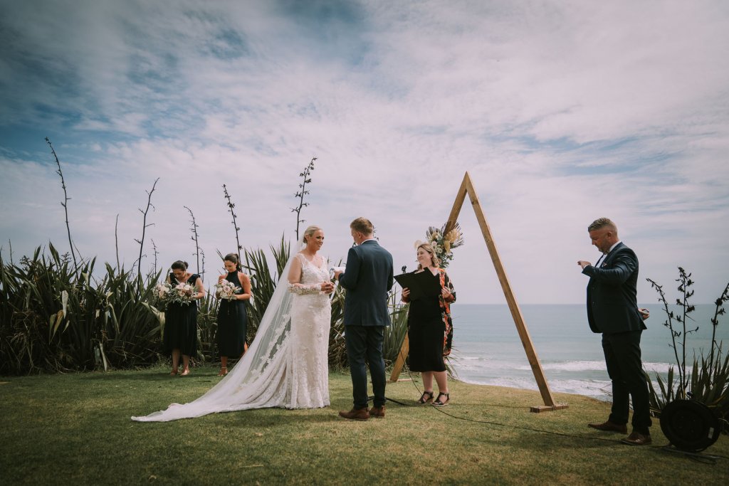 Real Bride Jamielle wearing her Custom Harriett Falvey Wedding Dress and Veil Made in New Zealand